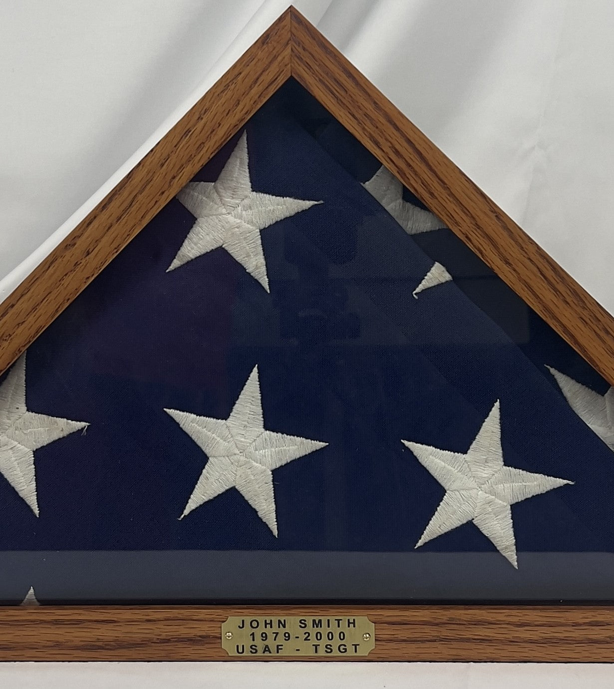 Memorial Flag Display Case for a 5' x 9' feet Burial Flag. The flag display case is handmade from solid wood.