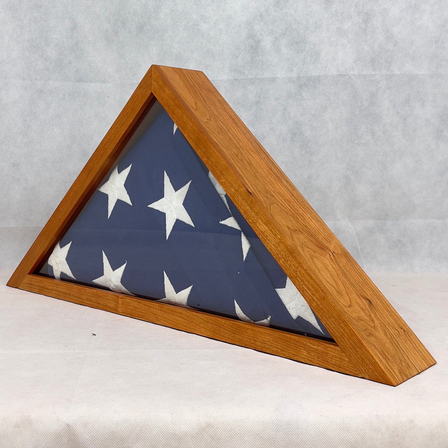 Memorial Flag Display Case for a 5' x 9' feet Burial Flag. The flag display case is handmade from solid wood.
